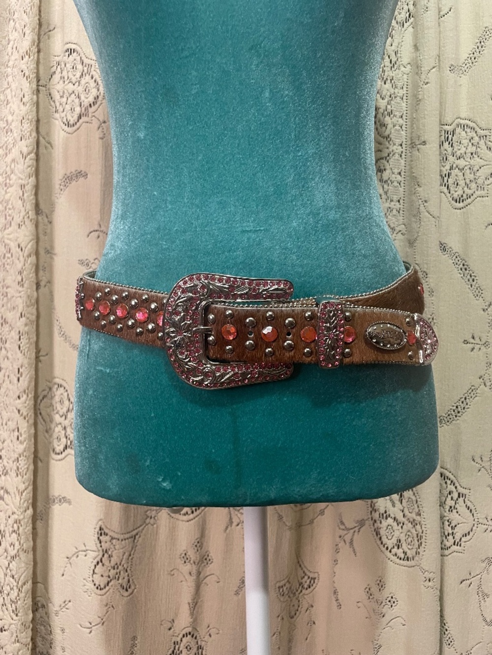 WB Atlas: Western-style belt featuring brown hair-on leather and pink crystals